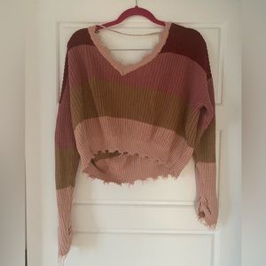 Long sleeve, color block in dark red, pink, tan, cream colors Size L sweater